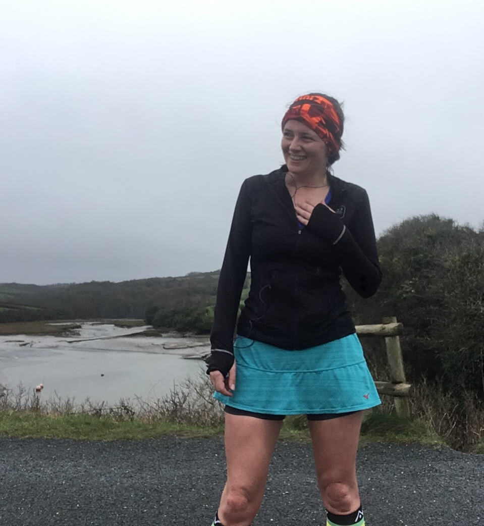 Penny Bedford in front of a beach